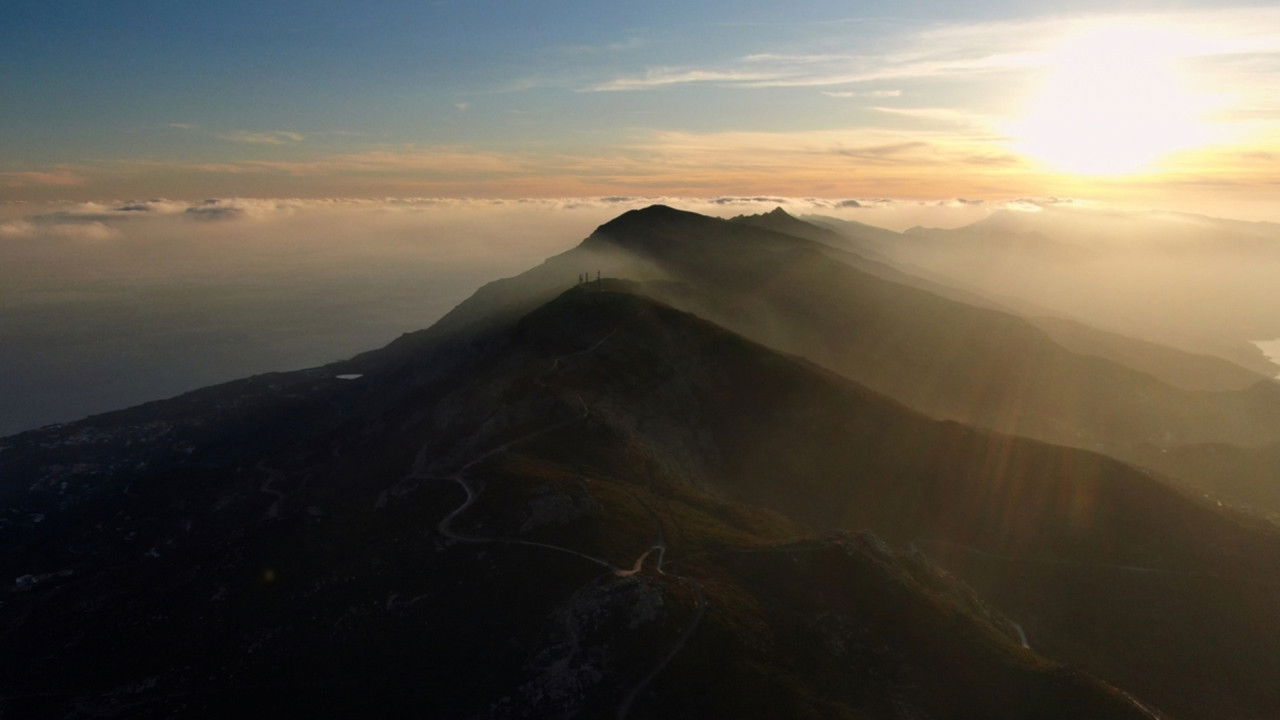 The Charcoal Makers of Ikaria Island backdrop