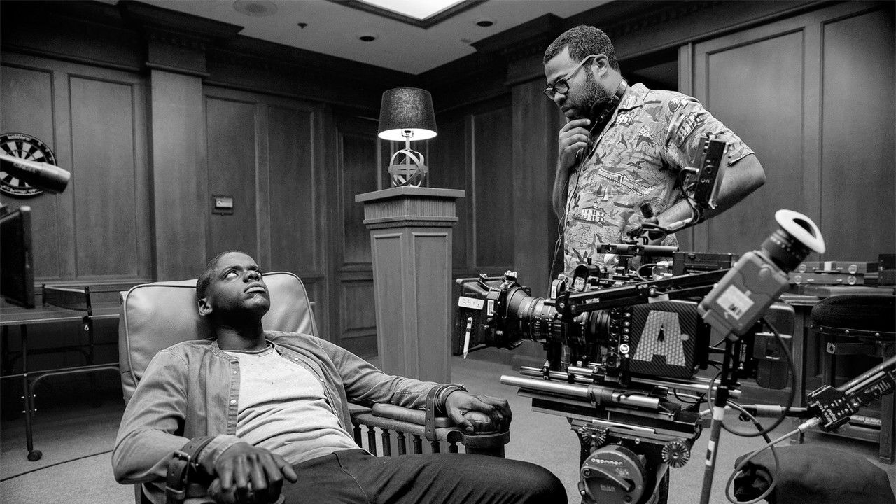 Unveiling the Horror of Get Out backdrop