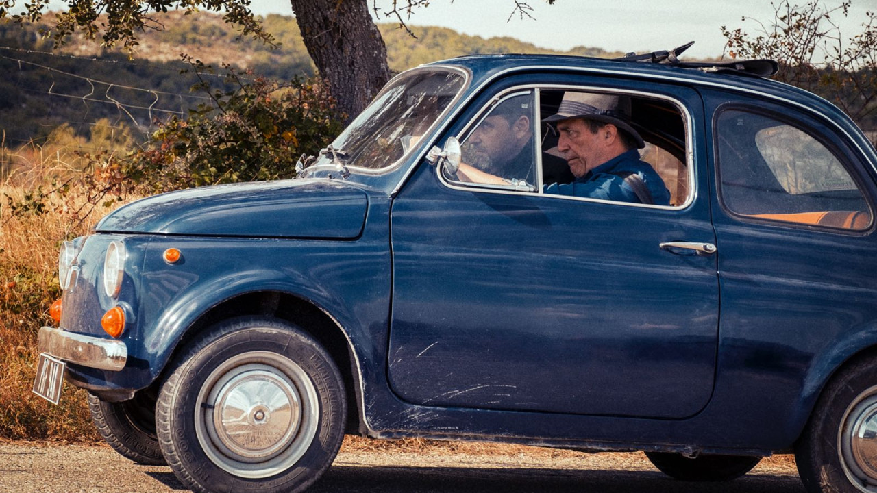 The Man in the Hat backdrop