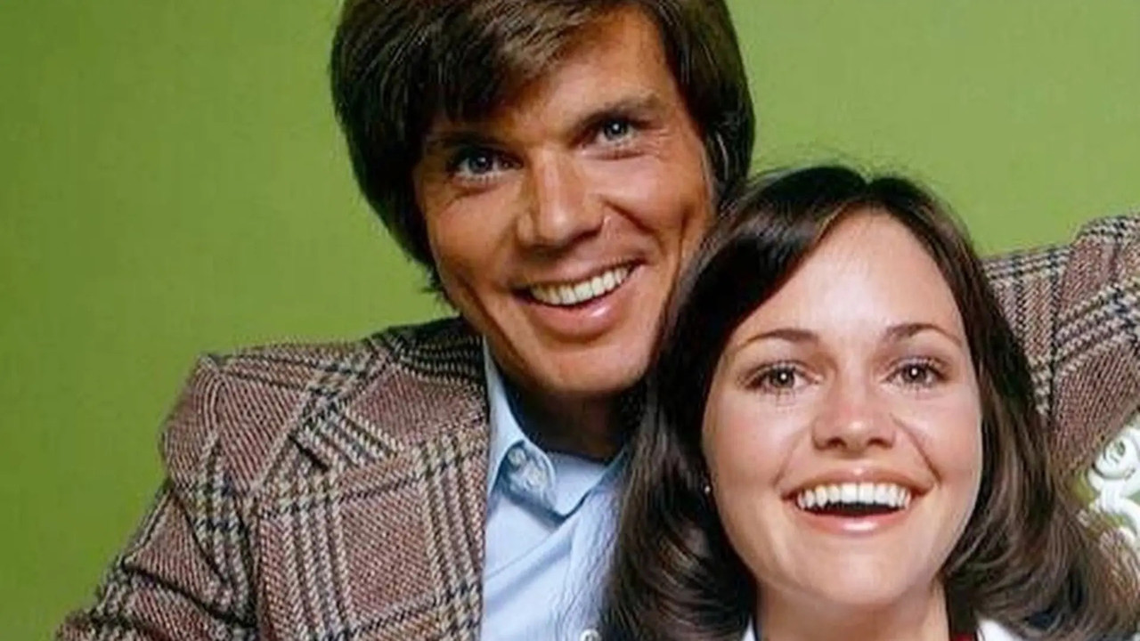 The Girl with Something Extra backdrop