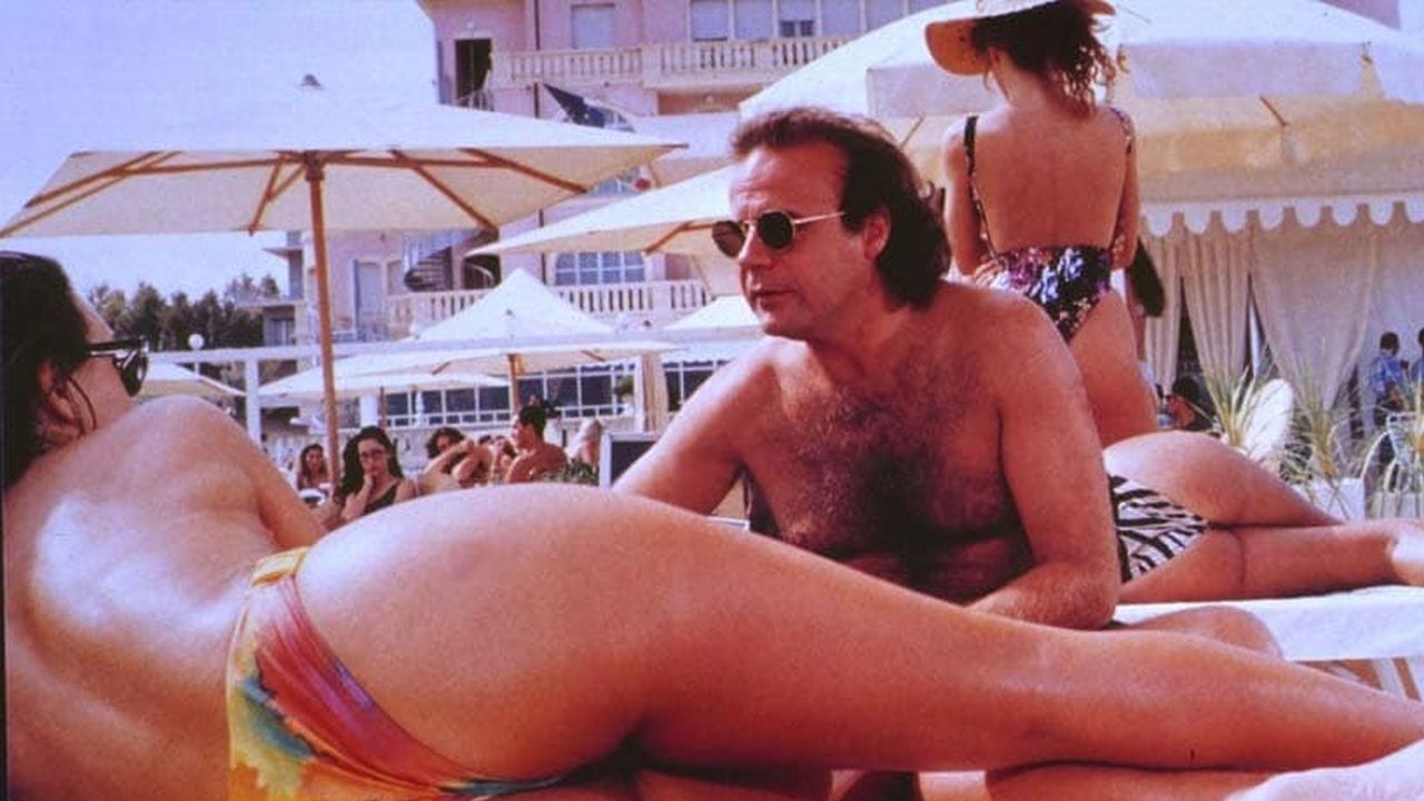 Suntanned: One Year Later backdrop