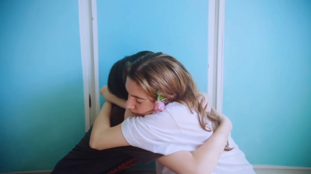 A Woman is a Flower backdrop