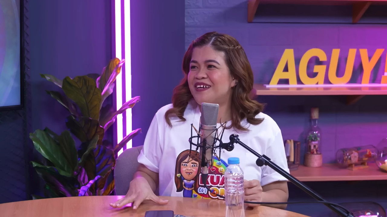 Kuan On One backdrop