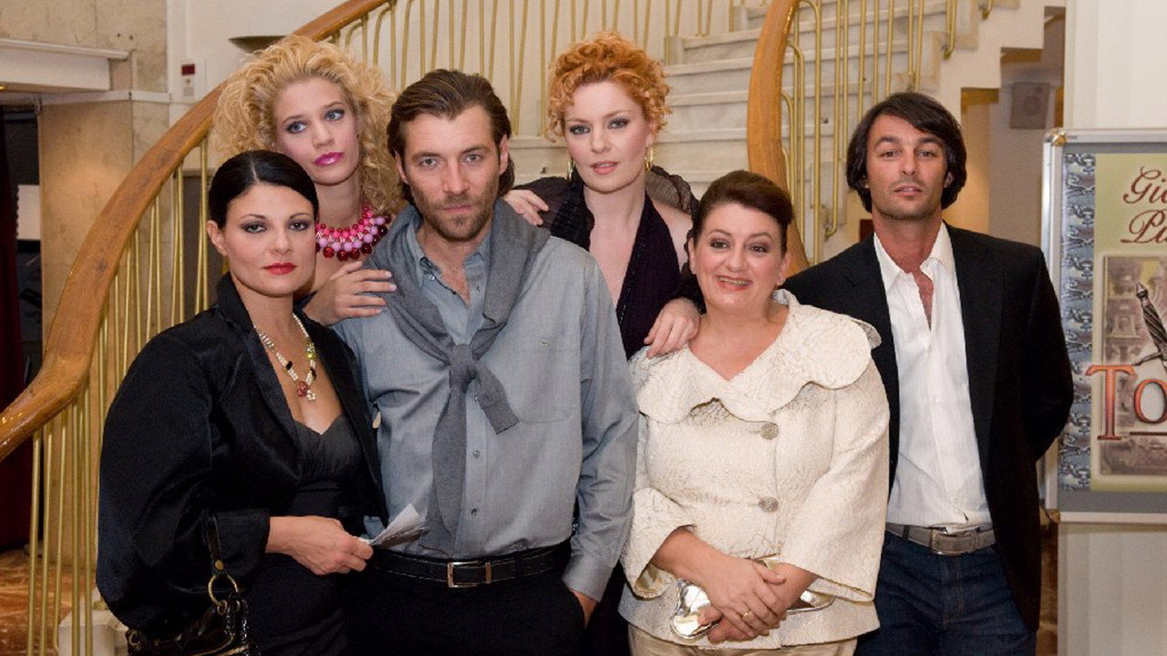 Poios mas pianei! backdrop