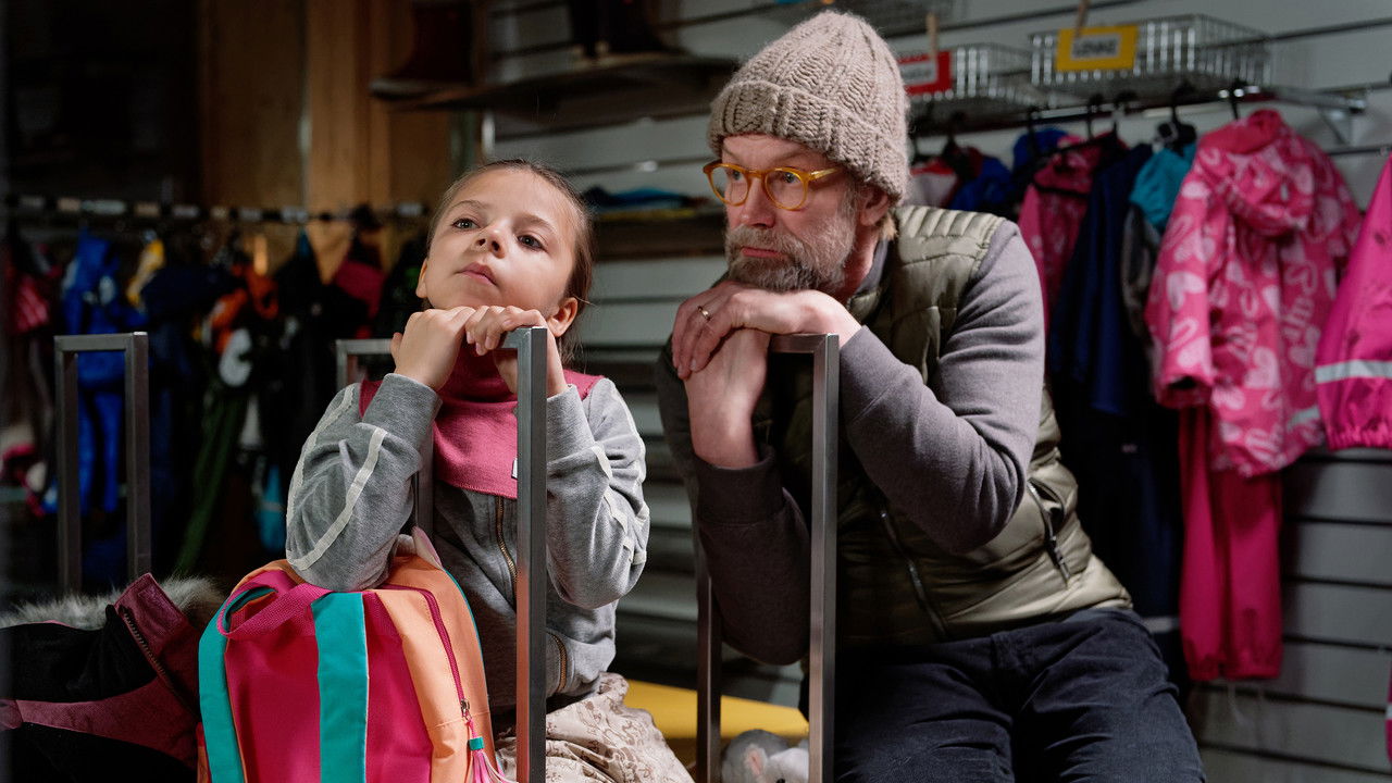 Man and a Junior backdrop