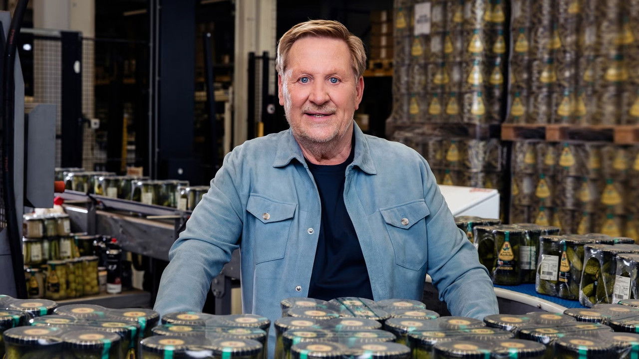 De Augurkenkoning in India backdrop