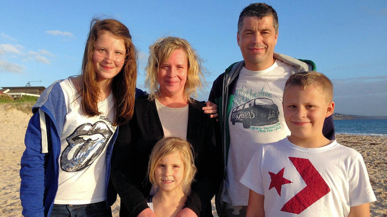 Wanted Down Under Revisited backdrop