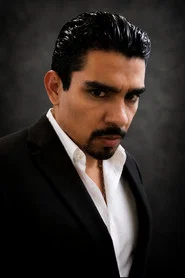 Photo of Erix Estrada as Ramses Solares