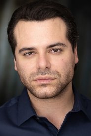 Photo of Michael A. Dean as Aaron Quinn
