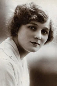 Photo of Chrissie White as Iris Tares