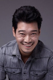 Photo of Yoon Seung-hoon as Duck-geun