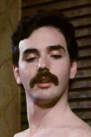 Photo of Greg Lyle as Man on bar top (uncredited)