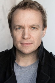 Photo of Gyuri Sarossy as John Ashton