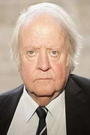 Photo of Richard Syms as Reg
