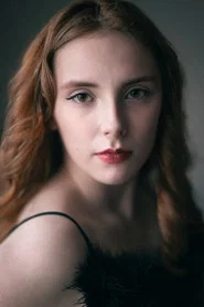 Photo of Nyah Williams as Hughs wife