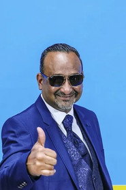 Photo of Yugan Naidoo as Preggie Naidoo