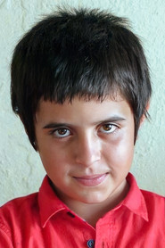 Photo of Doğan İzci as Aslan