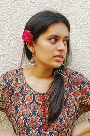 Photo of Rhythm Rajyaguru as Nisha