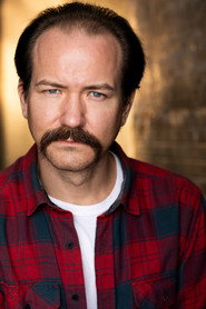 Photo of Trevor Champion Rogers as Officer 1