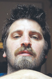 Photo of Adrián Biniez as Karaoke singer