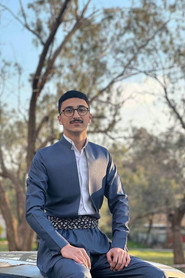 Photo of Karzan fazll as white figure