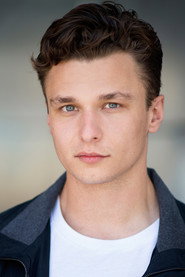 Photo of Callum Alexander as Adrian
