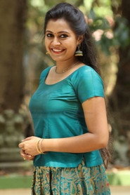 Photo of Meera Nair as Vandhana