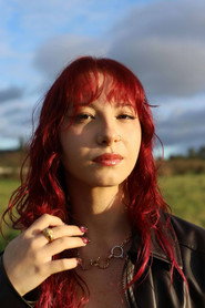 Photo of Débora Lopes as Íris Eanes