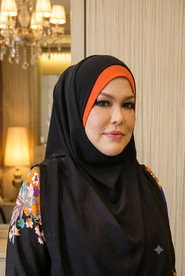 Photo of Farisha Irwayu as Datin Seri Hartina