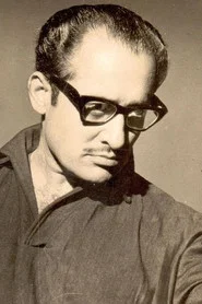 Photo of Nasir Hussain as Lala Daulatram Khanna