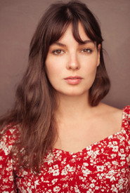 Photo of Marie Carrour as Mia
