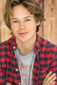 Photo of Alex Matthews as Young Tanner