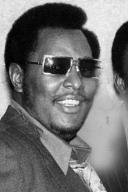 Photo of Bernard Crowe as Self (archive footage)