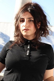 Photo of Jamie Manelis as Riley