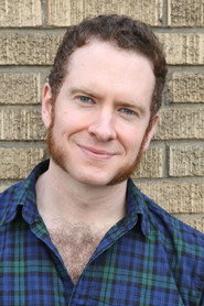 Photo of Adam Monley as Officer Maloney