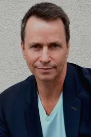 Photo of Brad Blumenthal as Hank Grisham