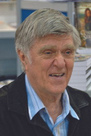 Photo of Alain Stanké as Un journaliste