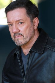 Photo of John Skoubis as Mr. Mills