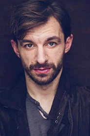 Photo of Scott Thomas as Elroy