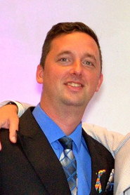 Photo of JT Fletcher as Derek Jenkins
