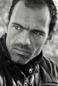 Photo of Slim El Hedli as Charles Landers