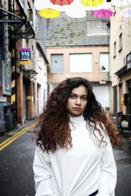 Photo of Neha Dubey as Immigrant lady in the neighbourhood
