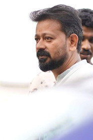 Photo of Martin Prakkat as Dr. Nirmal Jacob