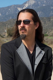 Photo of Bryan Beller as bass
