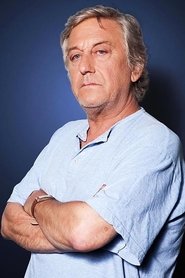 Photo of Patrick Poivey as Le barman