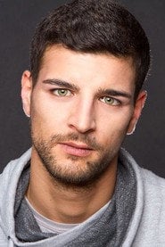 Photo of Ahmed Younoussi as Hassan