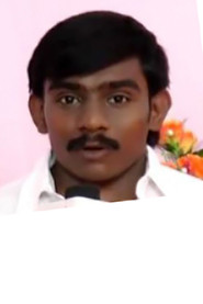 Photo of Arun Kumar as Murugan's assistant
