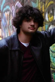 Photo of AJ Munro as Police Officer/Drummer