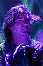 Photo of Denis Clement as Drums, fretless bass, keyboard