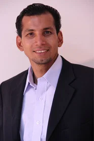Photo of Tuan Oliveros as Dr. Cifuentes